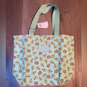 ALOHA Collection x Hello Kitty Hibiscus
Kitty Day Tripper Tan/Splash